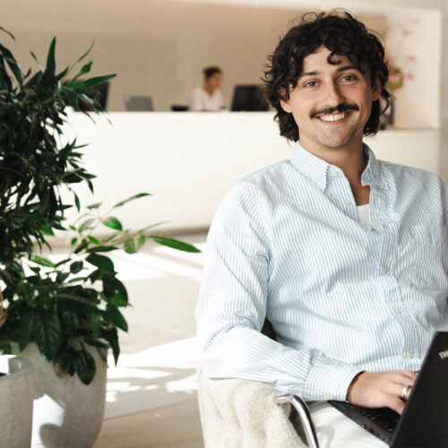 Portrait of H&M business intern sitting in the Stockholm Head Office reception