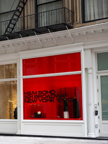 H&M store in Soho, New York, featuring red windows.