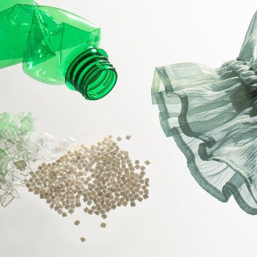 A plastic bottle and an item of clothing