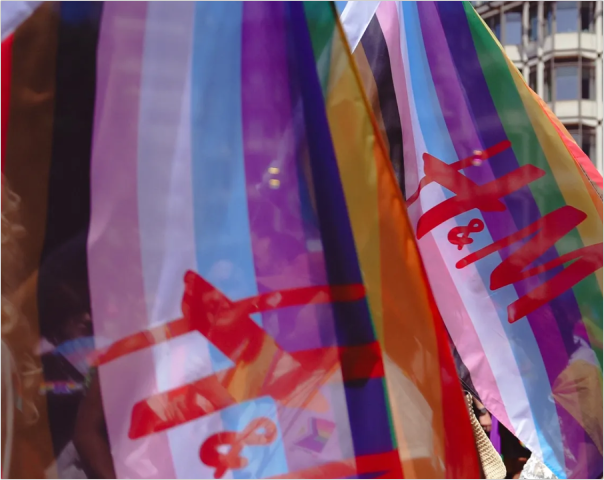 Pride flag at the Pride parade, showing H&M’s participation.