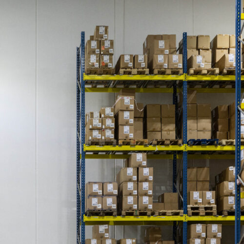 Stacked products in H&M's logistics warehouse.